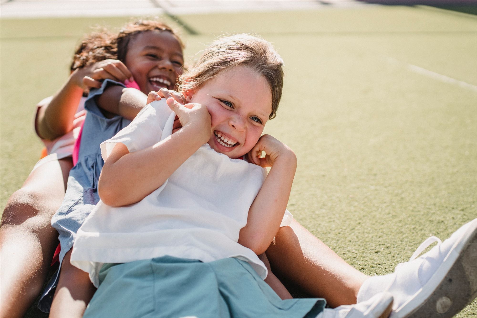 Kids laughing together outdoors